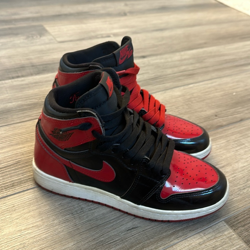 BLACK & RED JORDAN 1’s